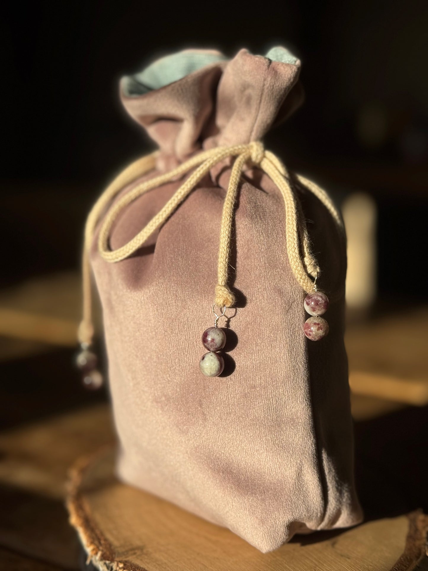 Handmade blush pink velvet rune bag with duck egg linen lining, cream cotton drawstring and cherry tourmaline beads.